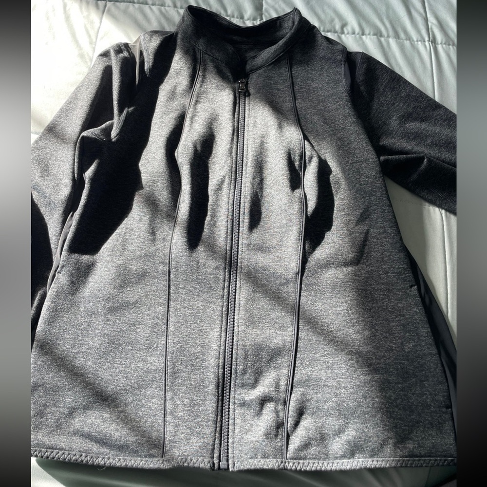 Under Armour zip up jacket Black and grey marble like color With pockets Medium